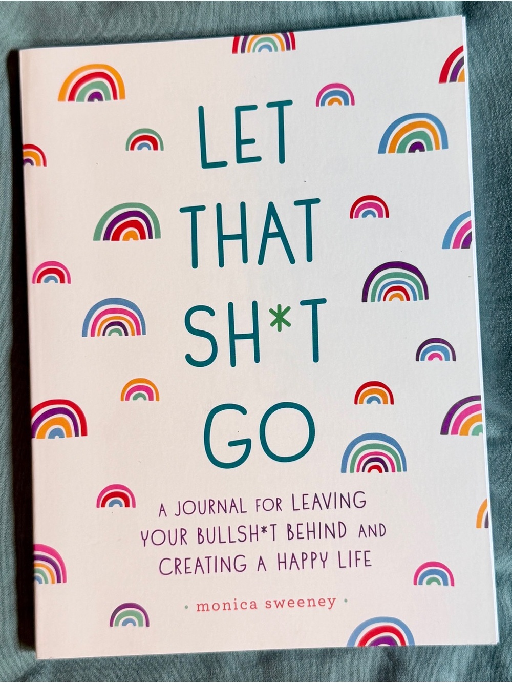 Let That Sh*t Go — White Rainbow Journal by Monica Sweeney